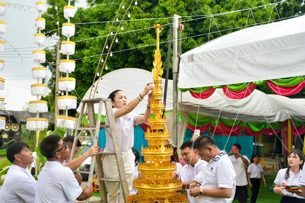 TTW participated in the annual Kathin ceremony in 2025 and raised the top of the Buddha image's umbrella at Wat Ban Phrao Nai, Pathum Thani Province