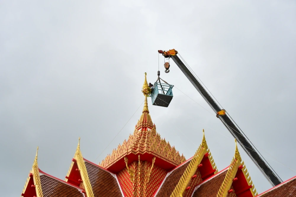 TTW participated in the annual Kathin ceremony in 2025 and raised the top of the Buddha image's umbrella at Wat Ban Phrao Nai, Pathum Thani Province